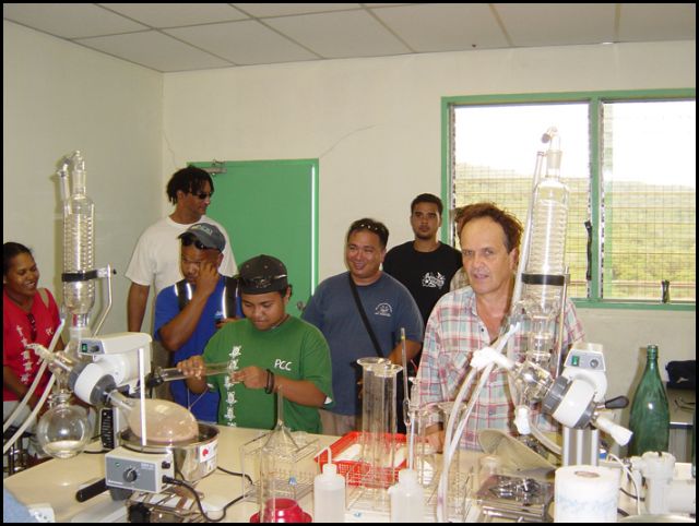 Eric Wolanski (right) with student volunteers